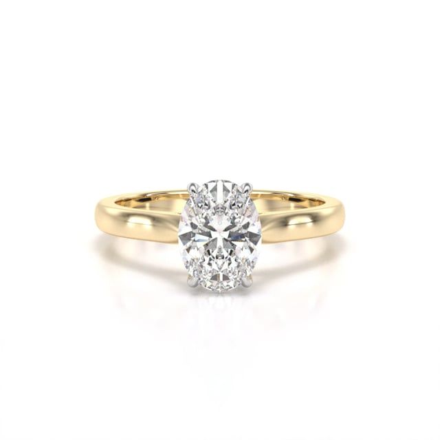 Video - A timeless oval cut solitaire diamond ring in 18ct yellow & white gold