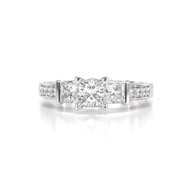 Video - A breathtaking three stone princess cut diamond ring with shoulder stones in 18ct white gold