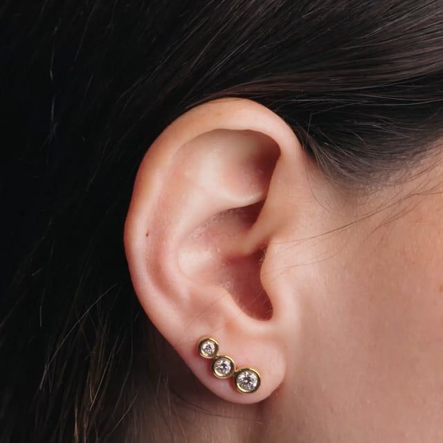 Video - A stunning pair of diamond three stone climber earrings in 18ct white gold
