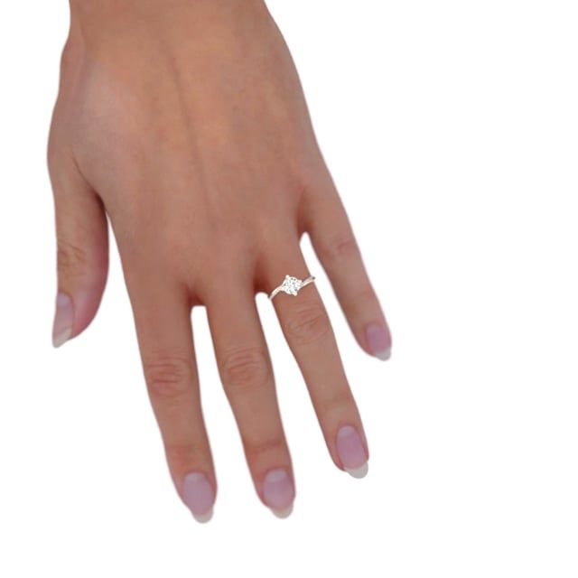 unknown – A beautiful round brilliant cut 'twist' engagement ring in 18ct yellow gold