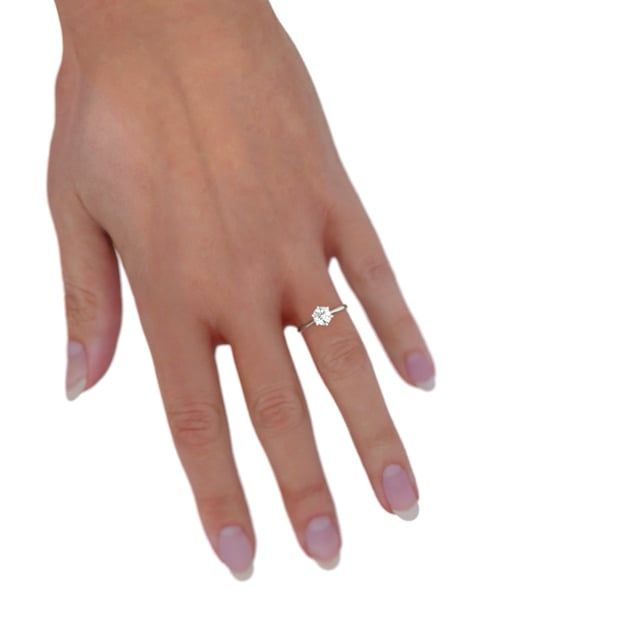 unknown – A beautiful round cut solitaire lab grown diamond ring in platinum