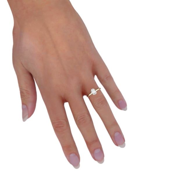 unknown – A beautiful lab grown oval cut diamond hidden halo in 18ct yellow gold