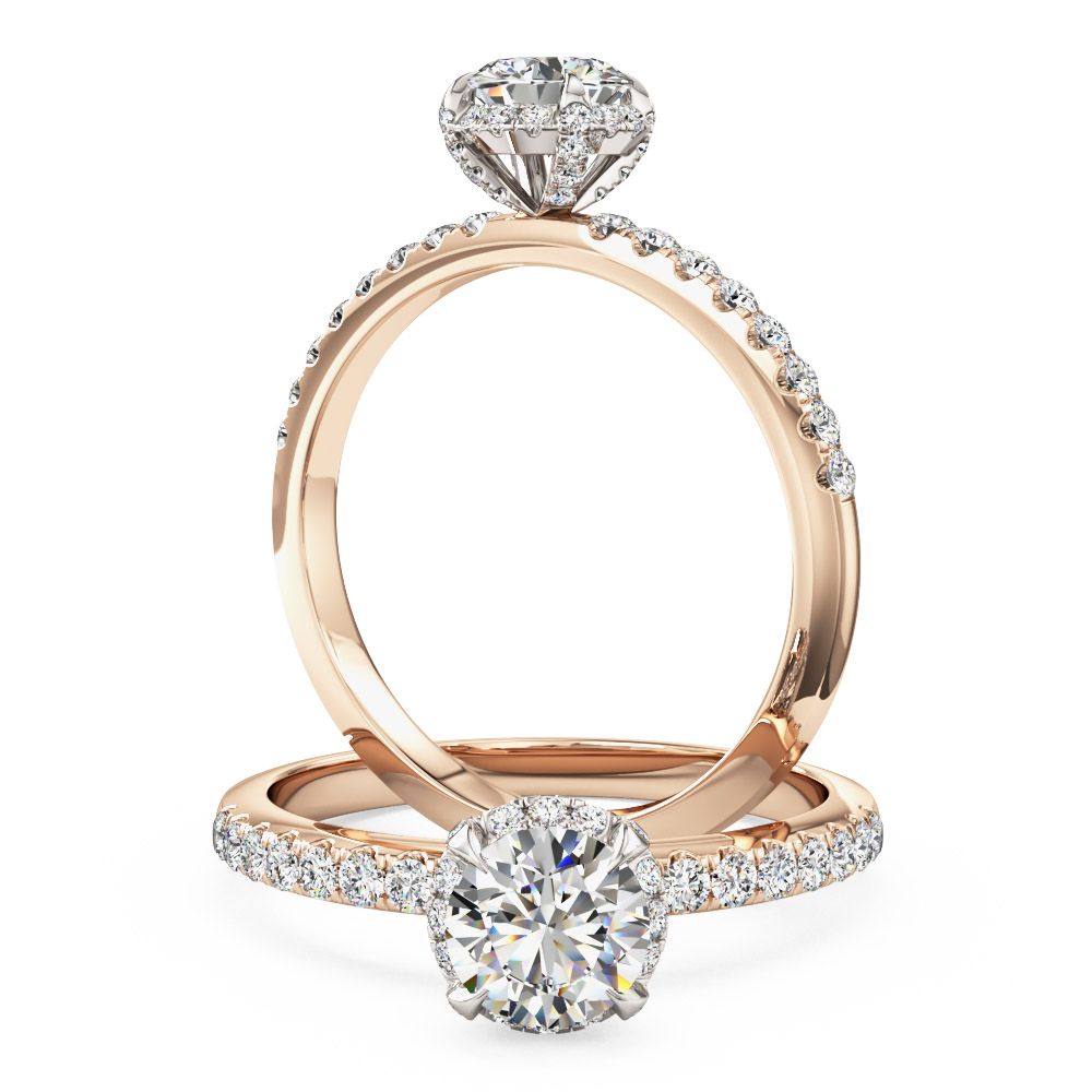 unknown – A stylish lab grown round brilliant cut diamond halo with shoulder stones in 18ct rose & white gold