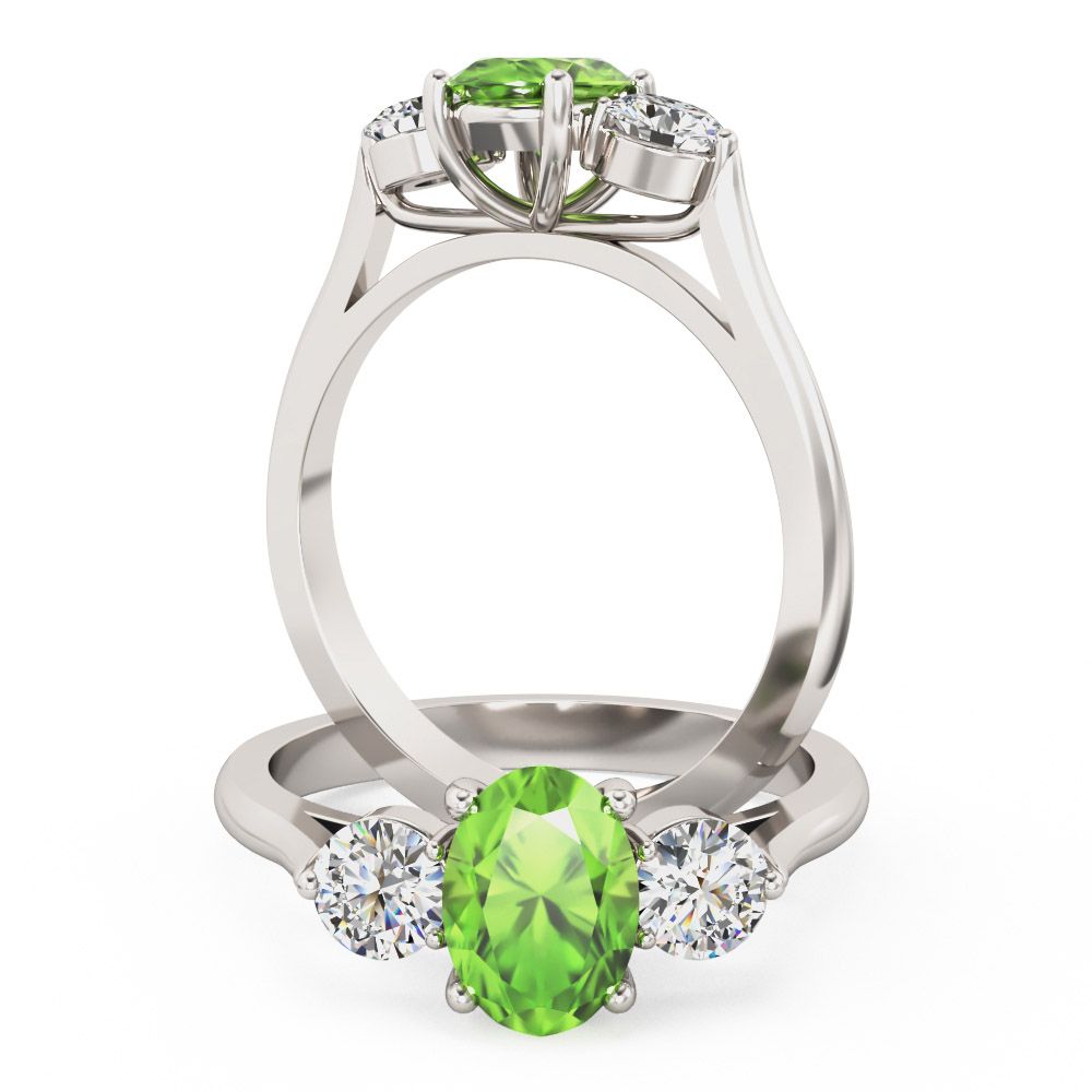 unknown – A beautiful peridot & diamond three stone ring in 18ct white gold