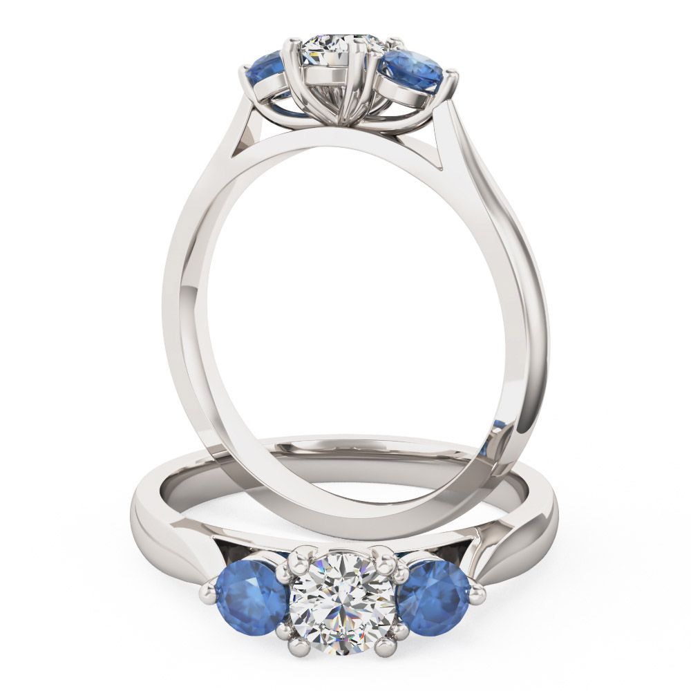 unknown – A beautiful round brilliant cut three stone sapphire and diamond ring in 18ct white gold