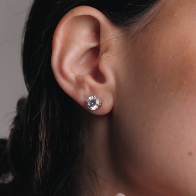 Video - A beautiful pair of round brilliant cut diamond earrings in 18ct white gold