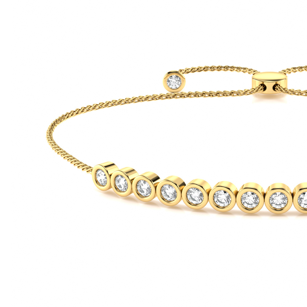 unknown – A stunning rub over set round brilliant cut diamond slider bracelet in 18ct yellow gold