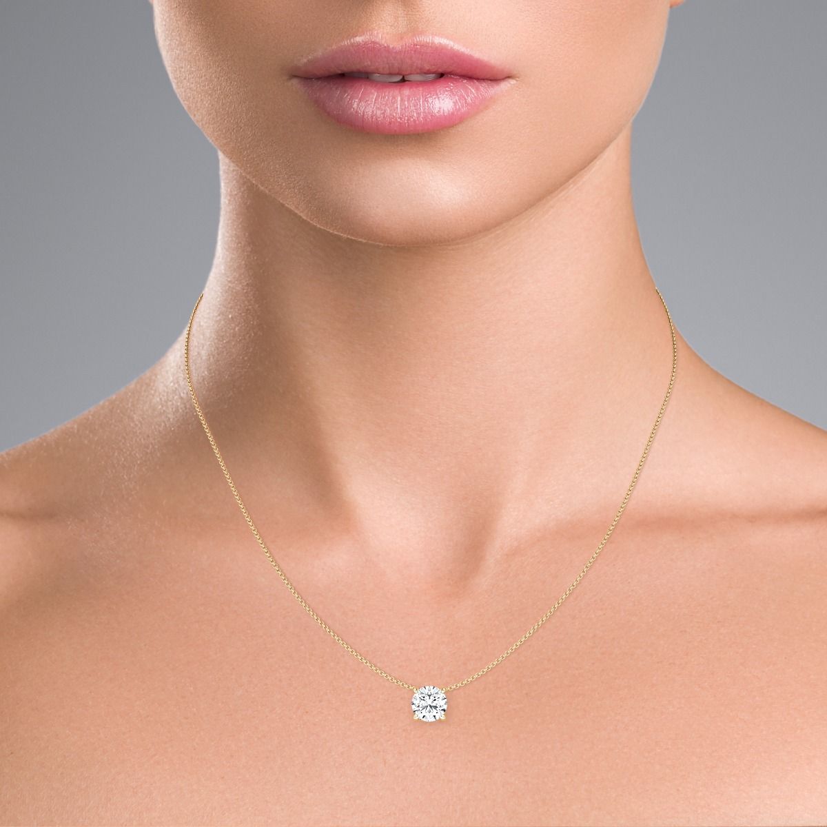 unknown –  A stunning round brilliant cut diamond pendant in 18ct yellow gold (In stock)